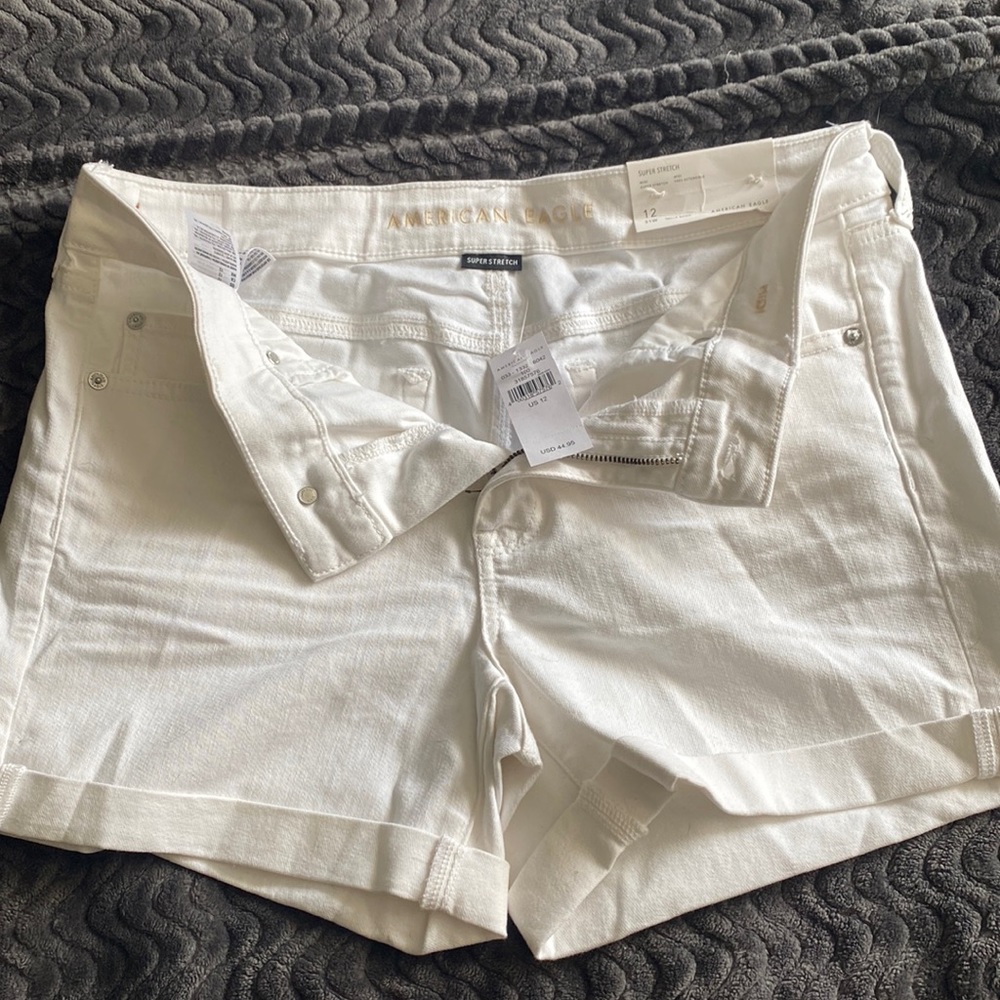 Super stretch midi white jean shorts